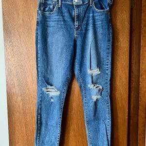 Levi high rise supper skinny distressed jean